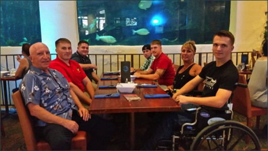 Pastor Steve Jensesn with members of the Wounded Warriors battalion