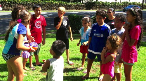 Children enjoying water balloon games