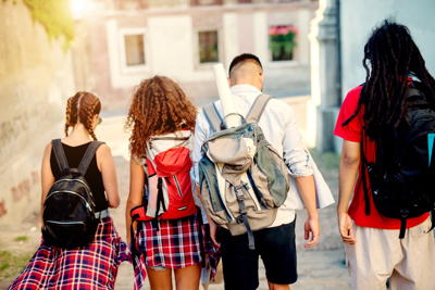 students with backpacks