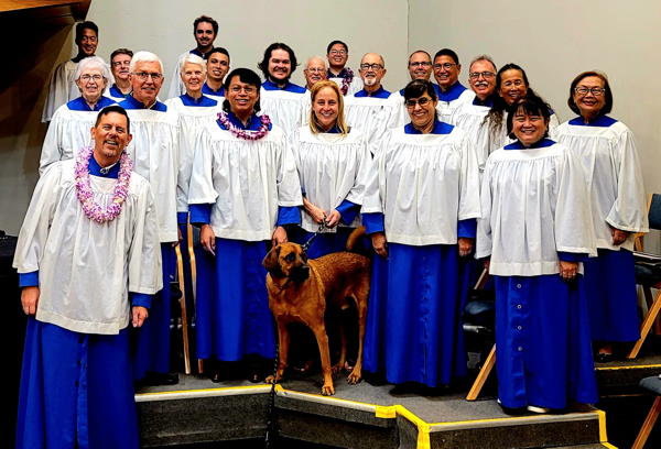 Following worship on the last Sunday of the choir season, members of the LCH Choir take a group picture along with Paxton, a regular attendee at Thursday evening rehearsals.