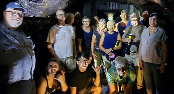 Group selfie from the back of the Waihe‘e Tunnel.