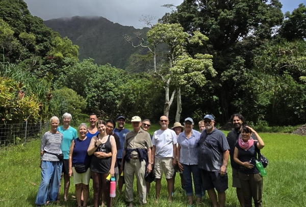 Group photo in the meadow outside of the Waihe’e Tunnel at the foot of the Ko’olau Mountains.