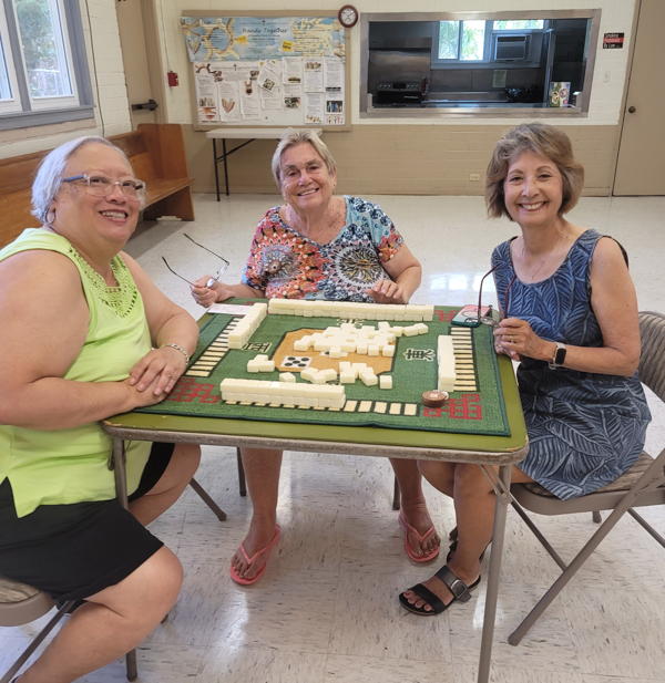 Everyone is a winner! Jeanne Castello, Linda Miller, and LInda Muller playing mahjong.