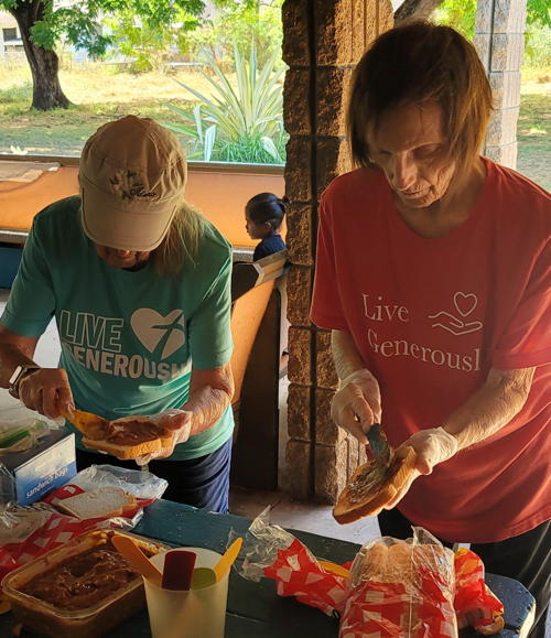 One Pot, On Hope volunteers preparing peanut butter and jelly sandwiches at Maluhia Lutheran Church.