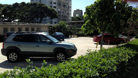 The back parking lot and entrance to the courtyard.