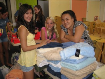 Youth from LCH and other congregations take a break from sorting items gathered in fall 2007.