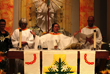 Pastor Angela celebrates communion during Easter Vigil