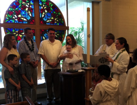 The baptism of the daughter of Janelle Hanson, baptized May 11