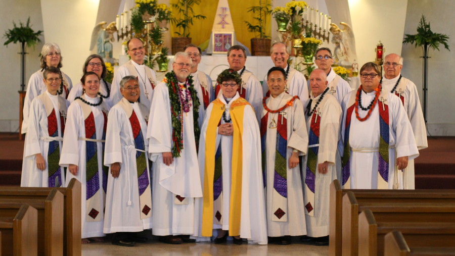 Huliklau clergy with Presding Bishop Eaton (center, with a head lei and wearing the LCH cope), Pacifica Synod Bishop Murray Finck (wearing a maile lei) following the closing worship service.