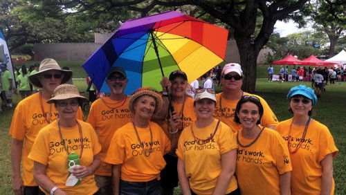 The walkers pose for a team photo prior to the beginning of the Walk