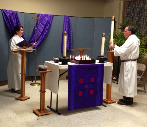 The cantors place the lighted candle at the beginning of worship.