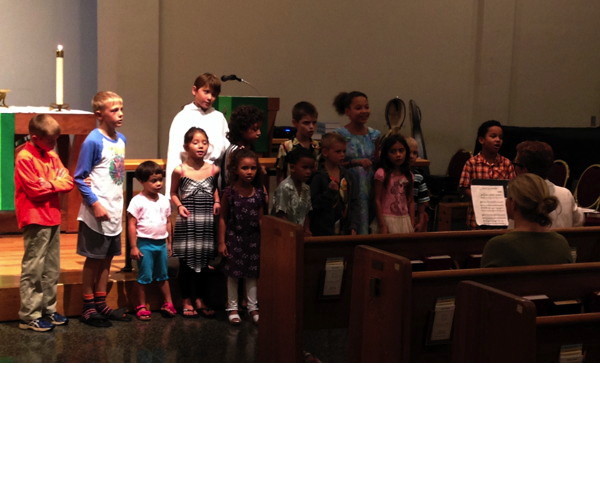 The children singing the call to worship