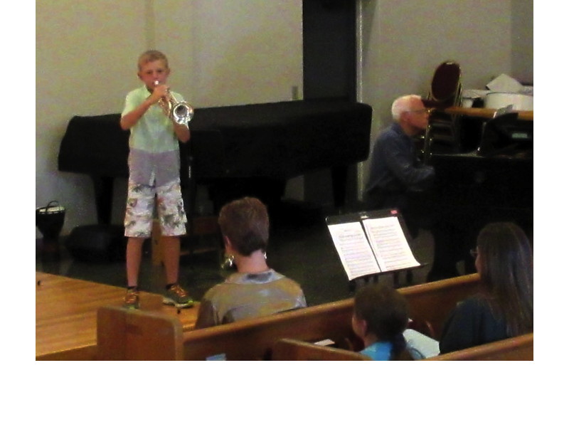 A boy played Jeremiah Clarke’s “Trumpet Voluntary.”