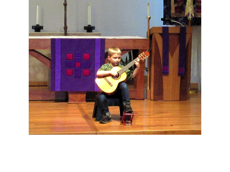 A boy played a guitar arrangement of Beethoven’s “Ode to Joy.”