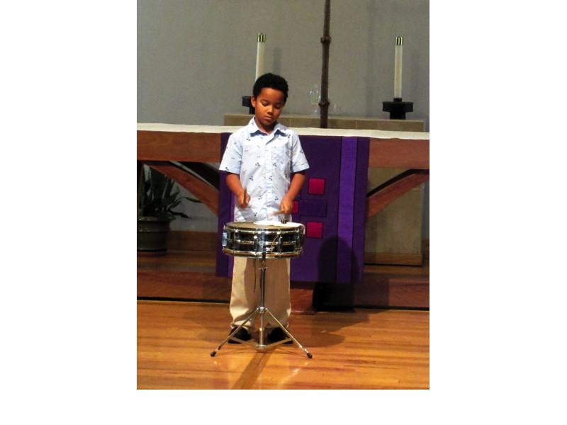 A boy played “Hip Little Sixteen” by Murray Hollif on the snare drum.