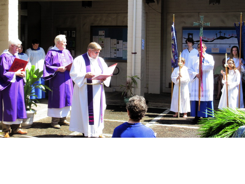 The Palm Sunday liturgy began in the courtyard with the reading of Mark’s account of Jesus’ entry into Jerusalem and then the blessing and distribution of palms.