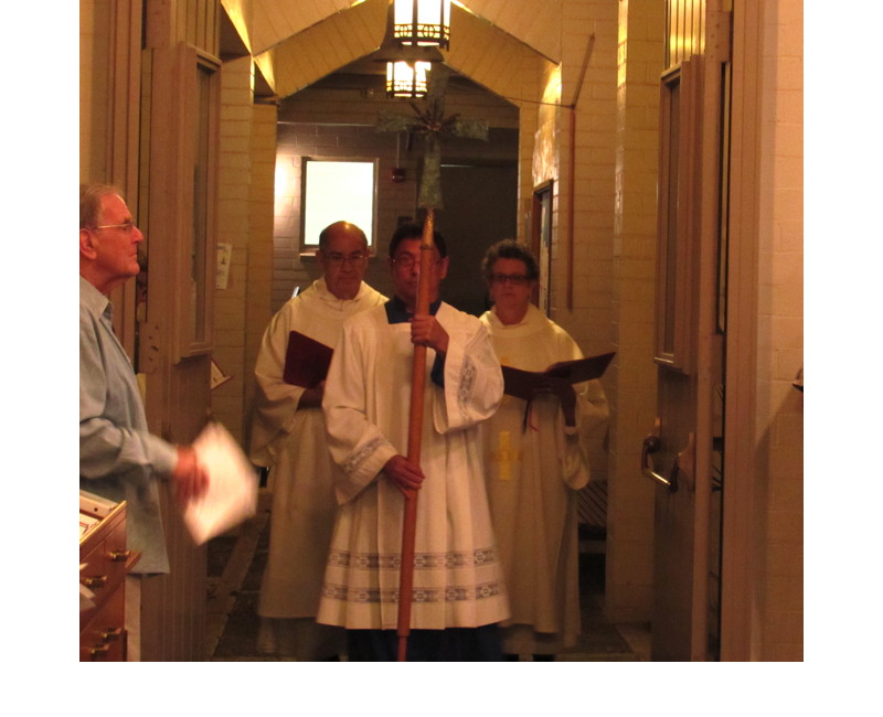 The ministers entered the Nave to begin the service as the choir chanted the introit for the day.