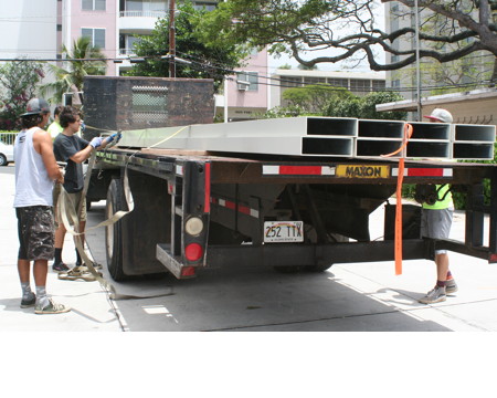 Truck delivering courtyard assembly parts, Monday, April 20