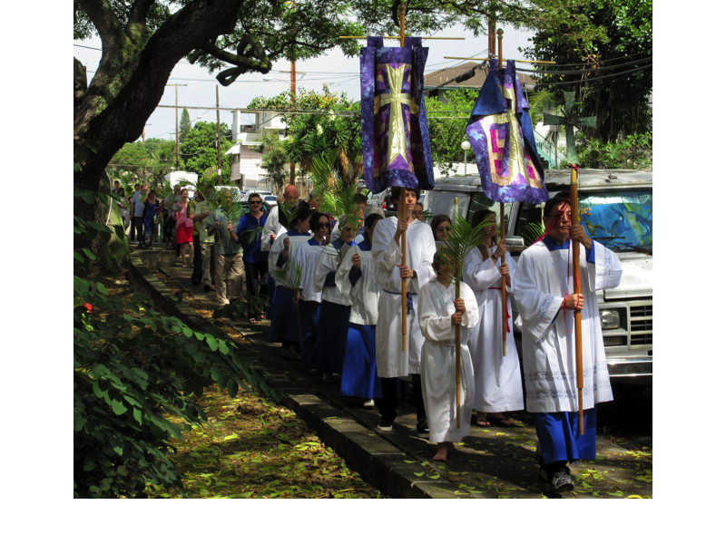 The procession circled the church building, with everyone singing “All glory, laud, and honor.”