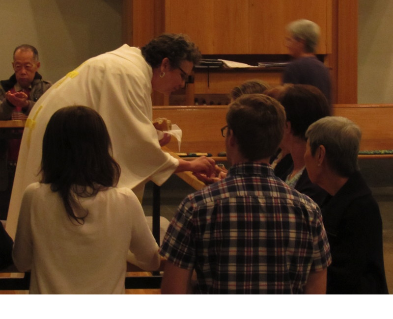 The elements of communion were distributed at the rail in remembrance of the institution of the sacrament.