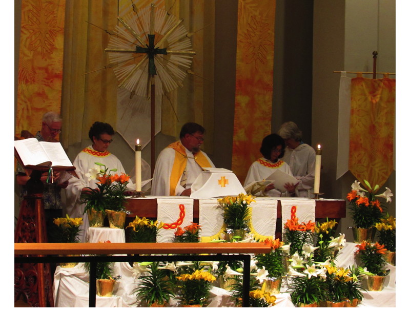 The Vigil concluded with the celebration of communion amid the beautiful array of Easter lilies.