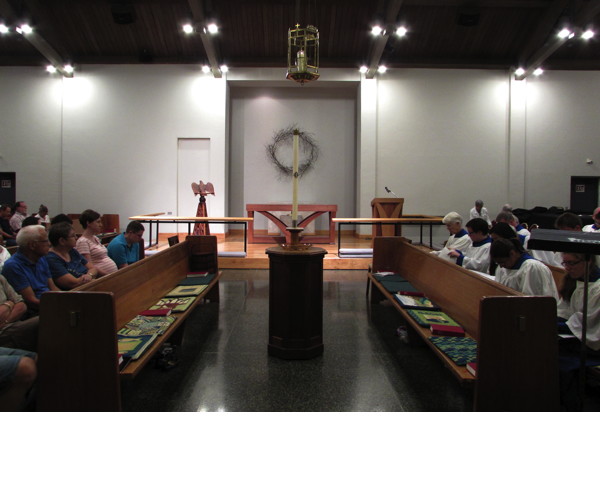 Worshippers meditated in the bare Nave.