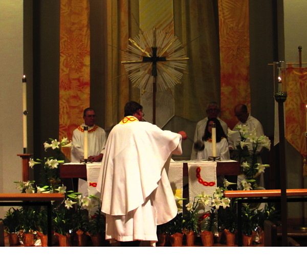 Pastor Jeff incensing the altar at communion.