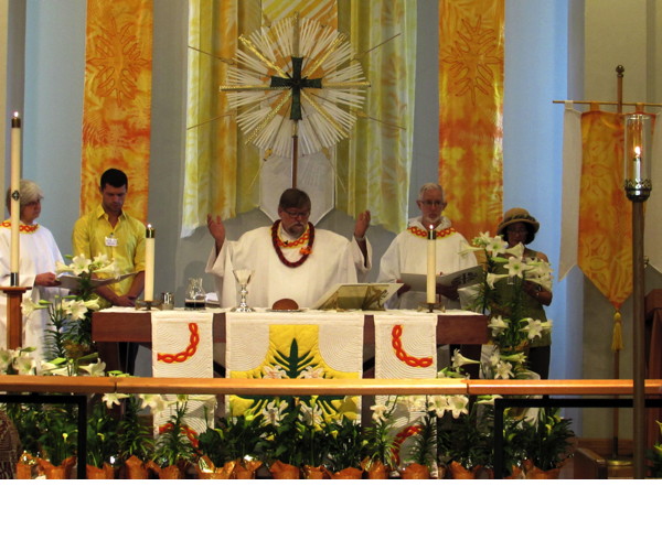 Celebrating communion amid the festive Easter decorations.